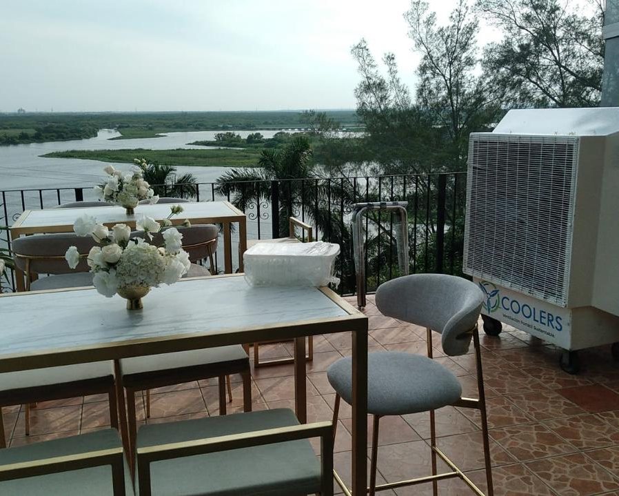 Terraza con vista al agua y cooler integrado